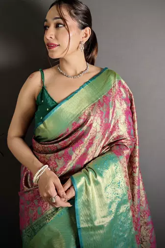 rust kanjeevaram silk blend zari woven saree with unstitched blouse piece.