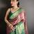 rust kanjeevaram silk blend zari woven saree with unstitched blouse piece.