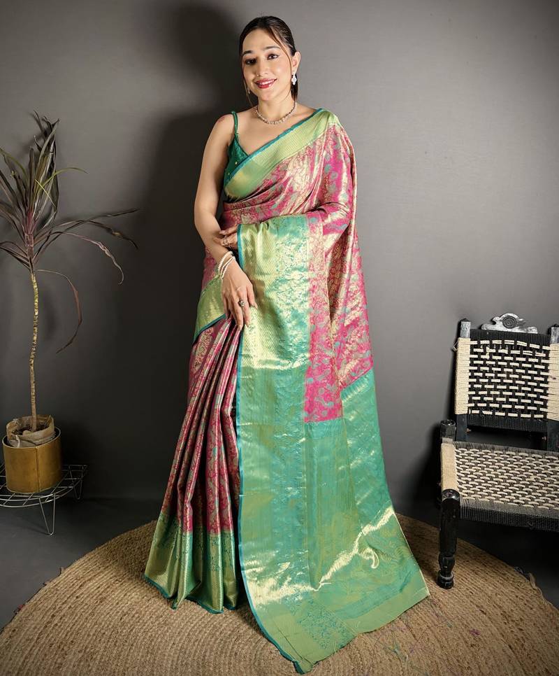 rust kanjeevaram silk blend zari woven saree with unstitched blouse piece.