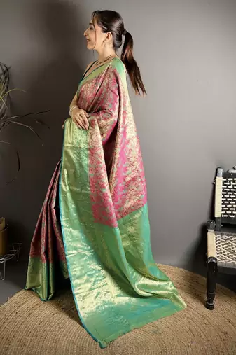 rust kanjeevaram silk blend zari woven saree with unstitched blouse piece.