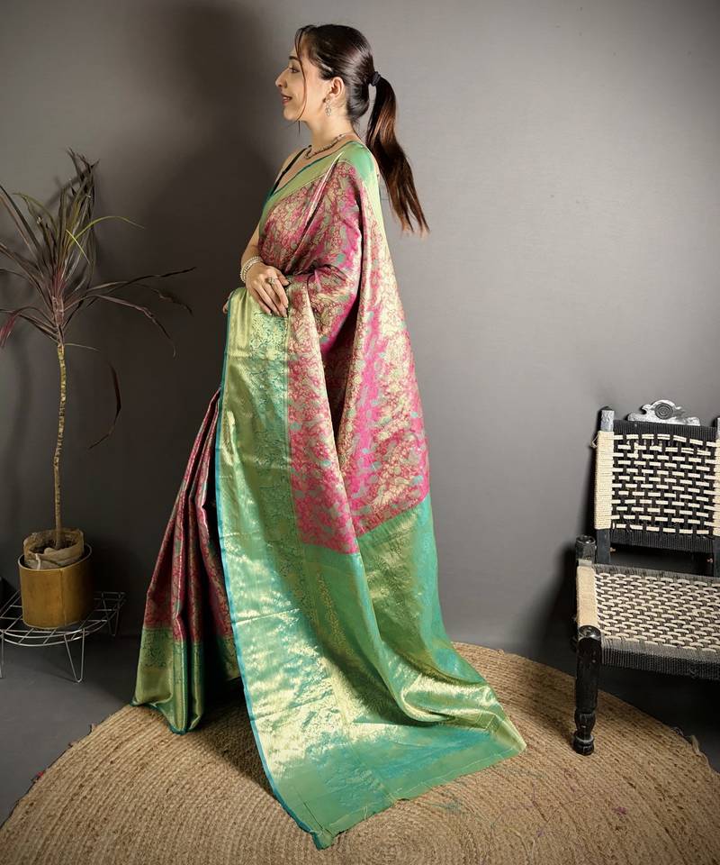 rust kanjeevaram silk blend zari woven saree with unstitched blouse piece.