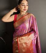 pink kanjeevaram silk blend zari woven saree with unstitched blouse piece.