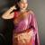 pink kanjeevaram silk blend zari woven saree with unstitched blouse piece.
