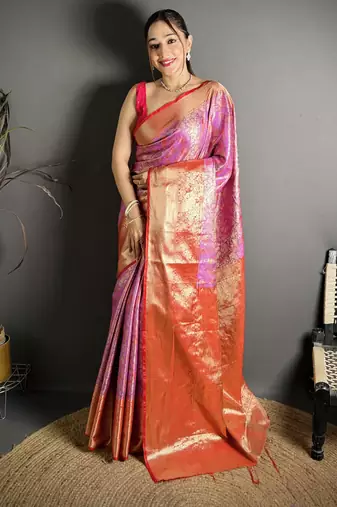 pink kanjeevaram silk blend zari woven saree with unstitched blouse piece.