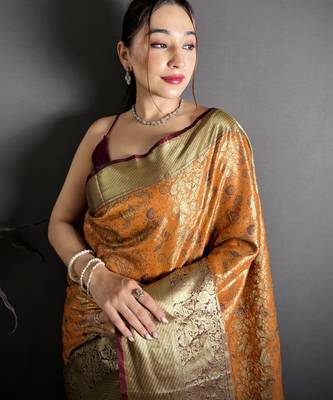 orange kanjeevaram silk blend zari woven saree with unstitched blouse piece. 1