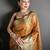 orange kanjeevaram silk blend zari woven saree with unstitched blouse piece.
