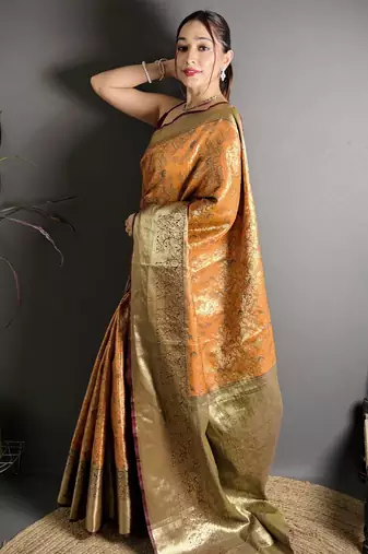 orange kanjeevaram silk blend zari woven saree with unstitched blouse piece.