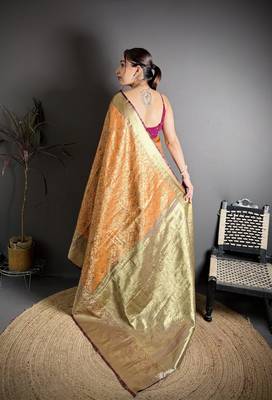 orange kanjeevaram silk blend zari woven saree with unstitched blouse piece. 4