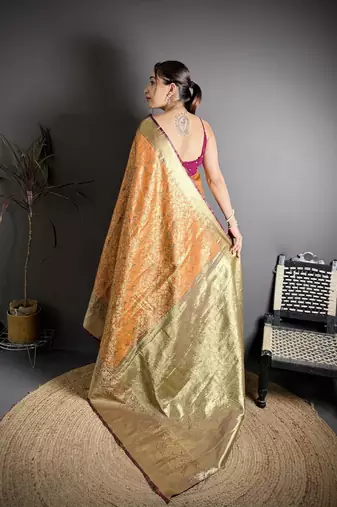 orange kanjeevaram silk blend zari woven saree with unstitched blouse piece.