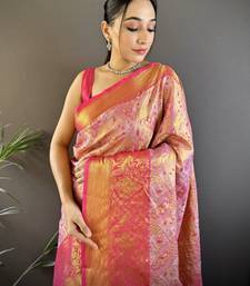 pink silk blend blend zari woven saree with unstitched blouse piece.