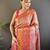 pink silk blend blend zari woven saree with unstitched blouse piece.