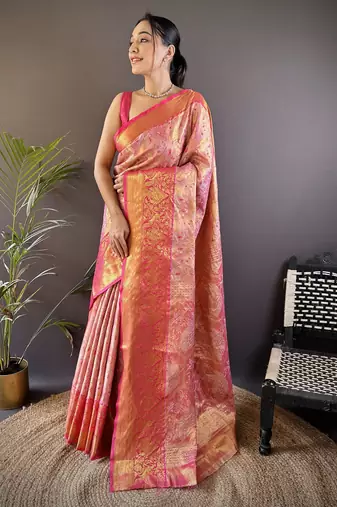 pink silk blend blend zari woven saree with unstitched blouse piece.