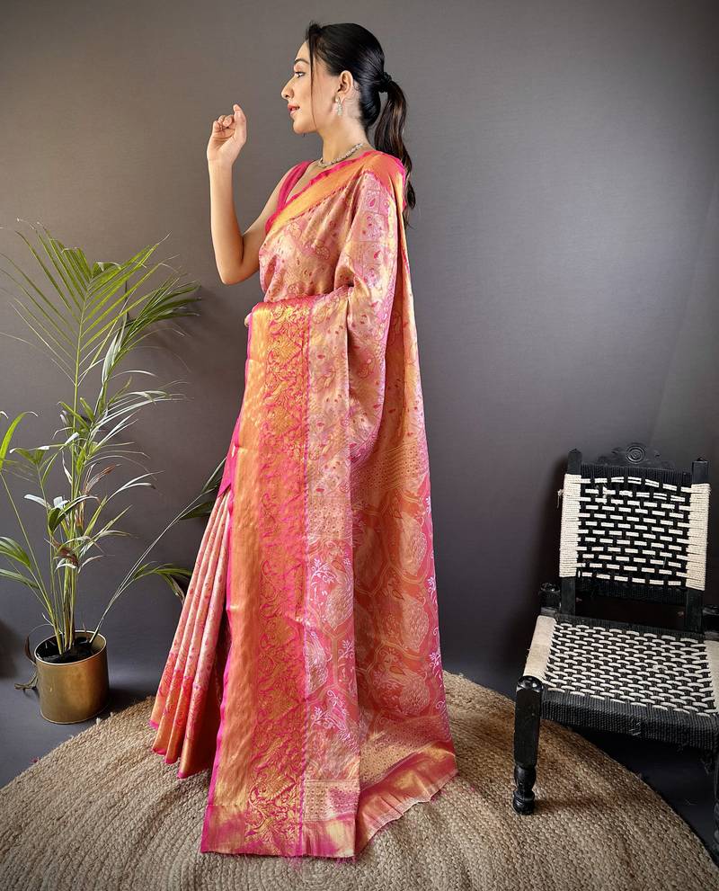 pink silk blend blend zari woven saree with unstitched blouse piece.