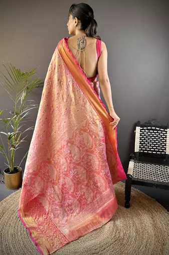pink silk blend blend zari woven saree with unstitched blouse piece.