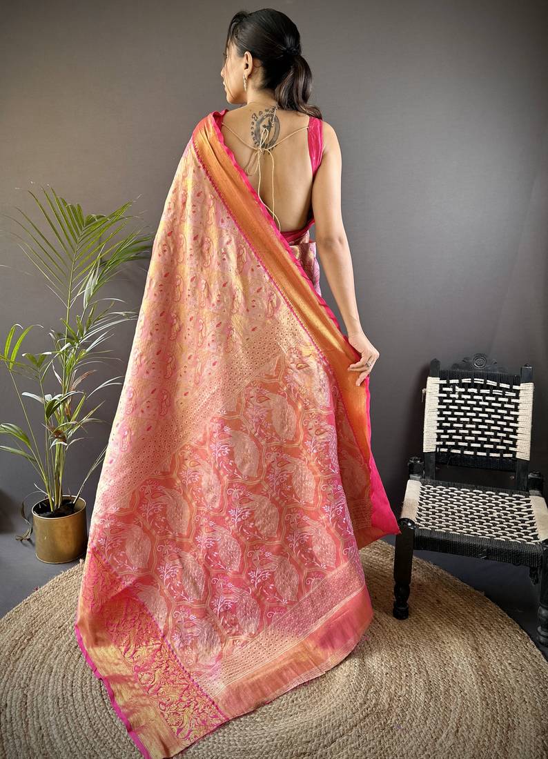 pink silk blend blend zari woven saree with unstitched blouse piece.