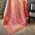 pink silk blend blend zari woven saree with unstitched blouse piece.