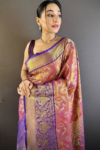 rust silk blend blend zari woven saree with unstitched blouse piece.
