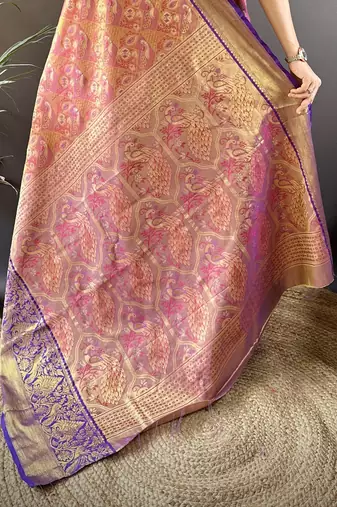 rust silk blend blend zari woven saree with unstitched blouse piece.