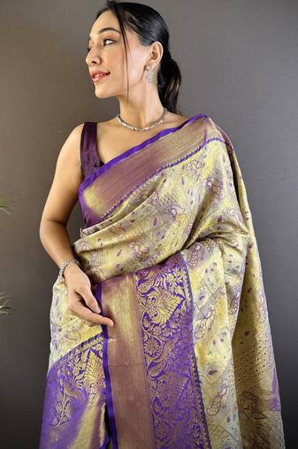 gold silk blend blend zari woven saree with unstitched blouse piece.