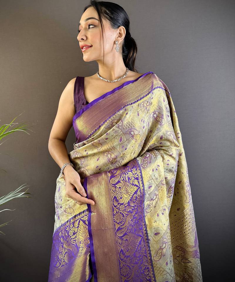 gold silk blend blend zari woven saree with unstitched blouse piece.