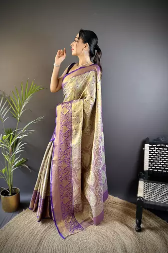 gold silk blend blend zari woven saree with unstitched blouse piece.