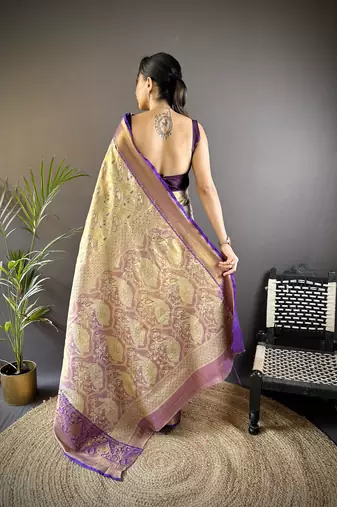 gold silk blend blend zari woven saree with unstitched blouse piece.