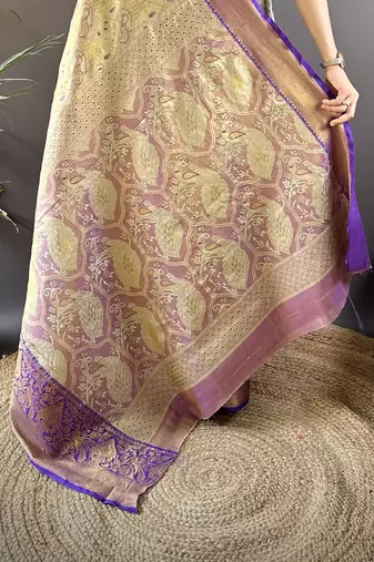 gold silk blend blend zari woven saree with unstitched blouse piece.