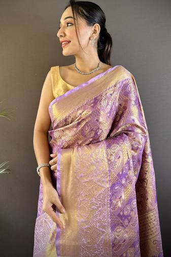 purple silk blend blend zari woven saree with unstitched blouse piece.