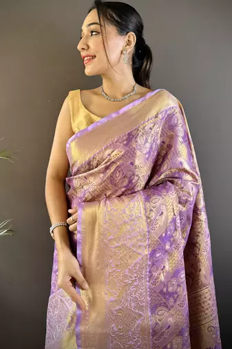 purple silk blend blend zari woven saree with unstitched blouse piece.