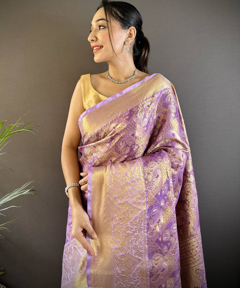 purple silk blend blend zari woven saree with unstitched blouse piece.