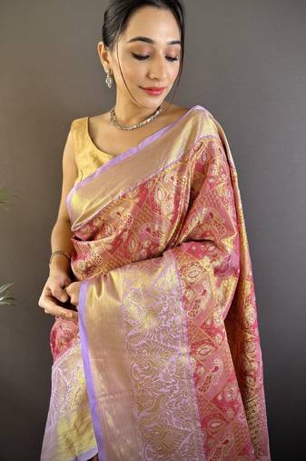 rust silk blend blend zari woven saree with unstitched blouse piece.