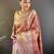 rust silk blend blend zari woven saree with unstitched blouse piece.