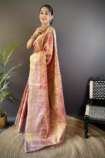 rust silk blend blend zari woven saree with unstitched blouse piece.