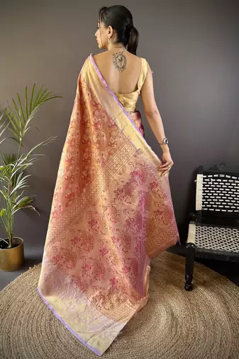 rust silk blend blend zari woven saree with unstitched blouse piece.