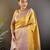 yellow silk blend blend zari woven saree with unstitched blouse piece.