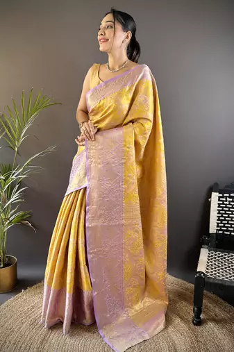 yellow silk blend blend zari woven saree with unstitched blouse piece.