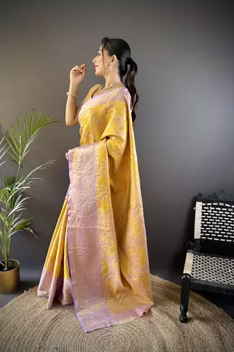 yellow silk blend blend zari woven saree with unstitched blouse piece.