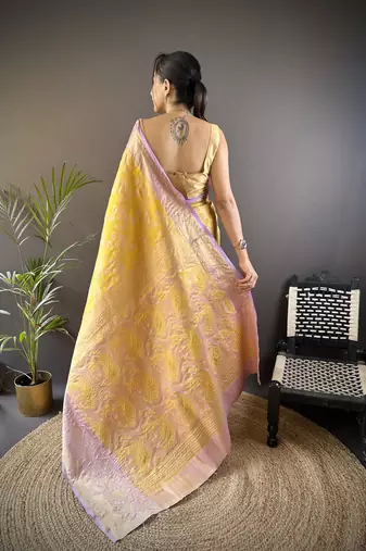 yellow silk blend blend zari woven saree with unstitched blouse piece.