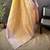 yellow silk blend blend zari woven saree with unstitched blouse piece.