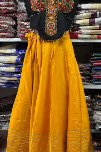 Yellow Rayon Navratri Lehenga Choli | Garba & Dandiya Outfit with Black Embroidery Sleeveless Sweetheart Neckline