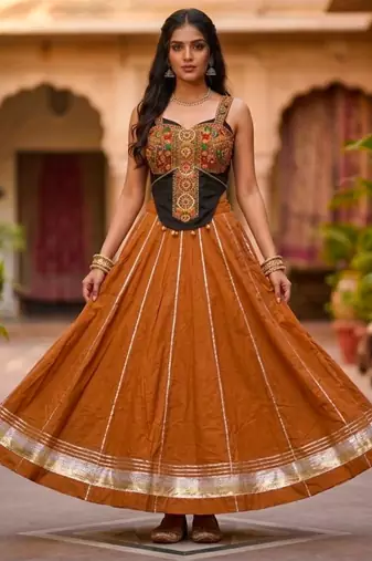 Orange Rayon Navratri Lehenga Choli | Garba & Dandiya Outfit with Orange Embroidery Sleeveless Sweetheart Neckline