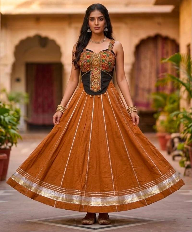 Orange Rayon Navratri Lehenga Choli | Garba & Dandiya Outfit with Orange Embroidery Sleeveless Sweetheart Neckline
