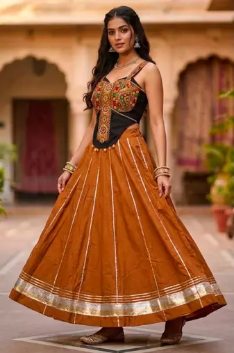 Orange Rayon Navratri Lehenga Choli | Garba & Dandiya Outfit with Orange Embroidery Sleeveless Sweetheart Neckline