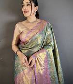 green kanjeevaram silk blend zari woven saree with unstitched blouse piece.