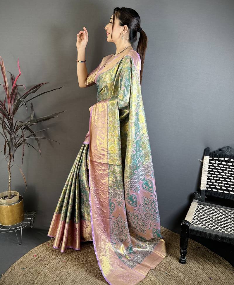 green kanjeevaram silk blend zari woven saree with unstitched blouse piece.