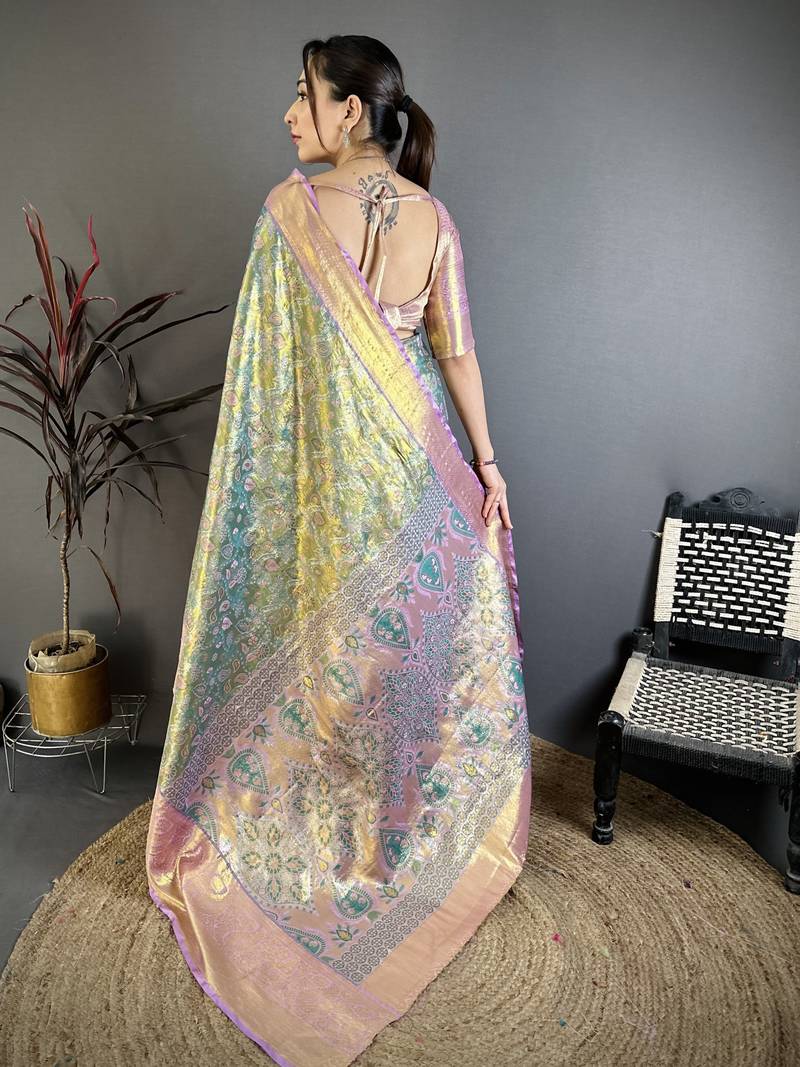 green kanjeevaram silk blend zari woven saree with unstitched blouse piece.
