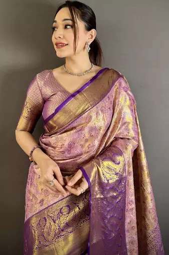 lilac kanjeevaram silk blend zari woven saree with unstitched blouse piece.
