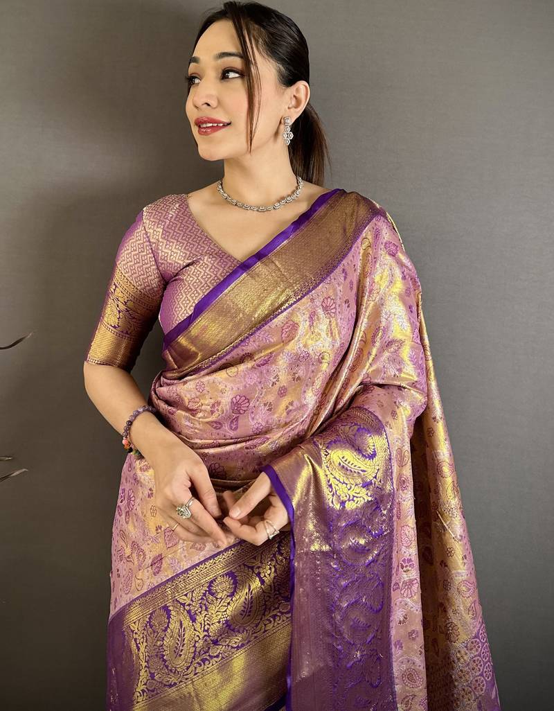 lilac kanjeevaram silk blend zari woven saree with unstitched blouse piece.