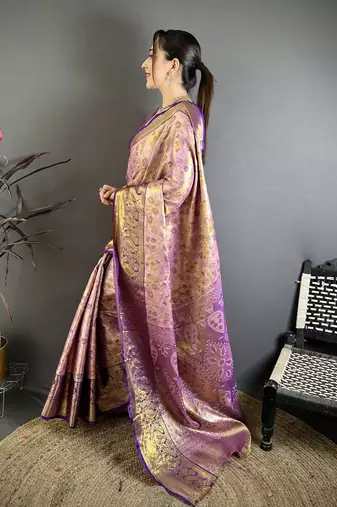 lilac kanjeevaram silk blend zari woven saree with unstitched blouse piece.