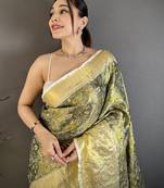 olive kanjeevaram silk blend zari woven saree with unstitched blouse piece.